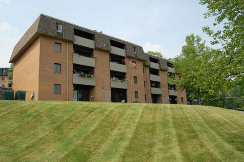 view of Surrey Gardens Apartments building